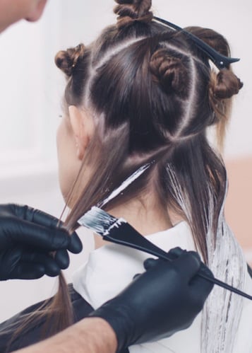 someone applying Balayage Craft techniques to hair someone applying Balayage Craft techniques to hair
