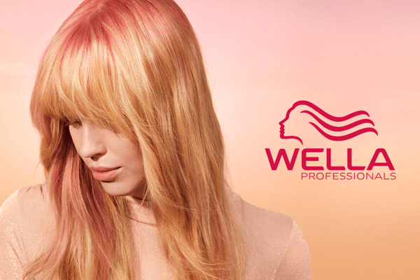 woman showing hair using wella products woman showing hair using wella products