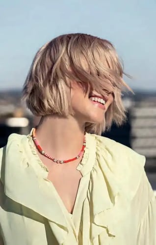 woman showing hair after adding color tones woman showing hair after adding color tones